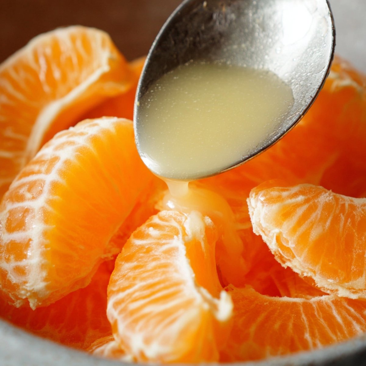 Put the orange segments into your blender or mixie jar. If you're using lemon juice, add it now. It's totally optional but adds a nice little kick.