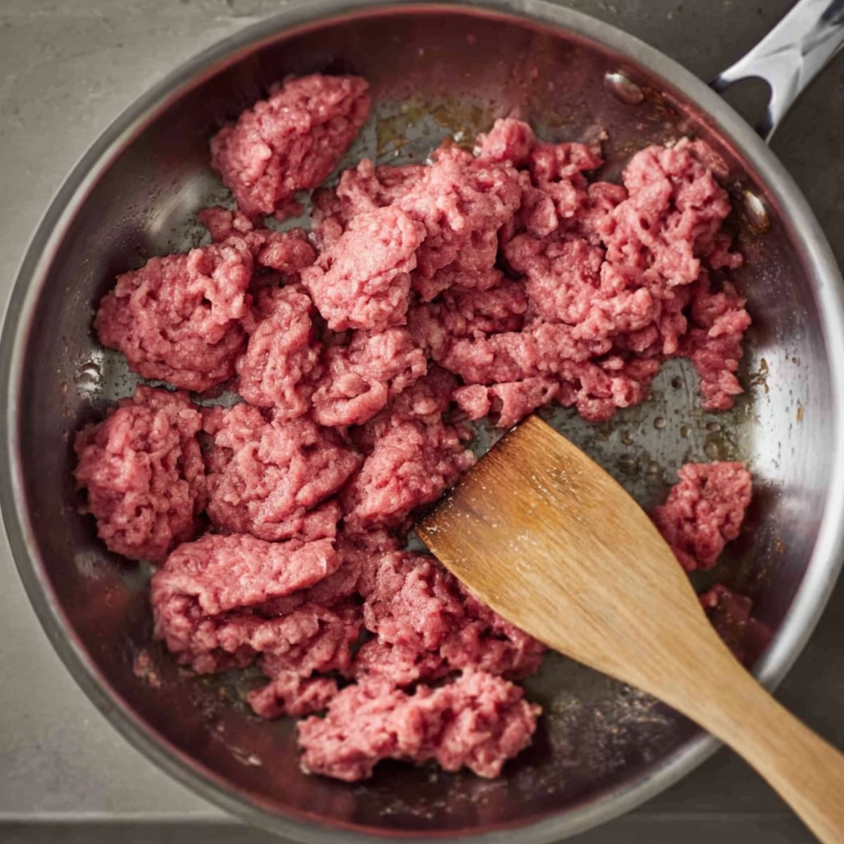 Preheat a heavy, deep pan over medium-high heat and add the olive oil. Let it warm up for a minute so the beef gets a nice sear.