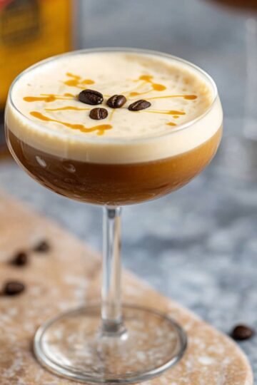 Salted Caramel Espresso Martini garnished with coffee beans.